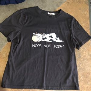 This is a grey ROMWE tee shirt. Size small. New, never worn but no tags.